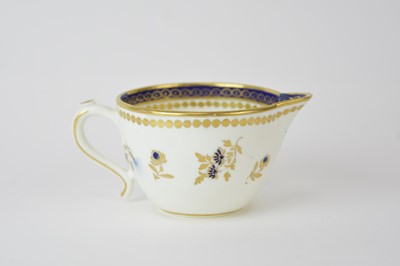 Lot 41 - A Caughley 'Dresden Flowers' milk jug, circa 1788-93