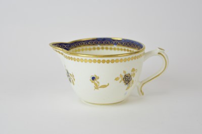 Lot 41 - A Caughley 'Dresden Flowers' milk jug, circa 1788-93