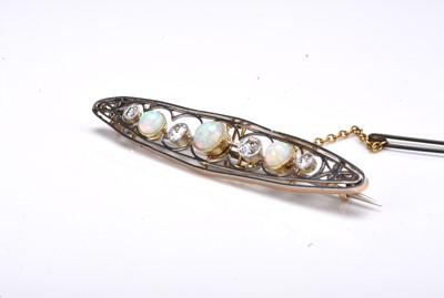 Lot 330 - An early 20th century opal and diamond bar brooch