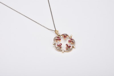 Lot An early 20th century ruby, diamond and seed pearl pendant