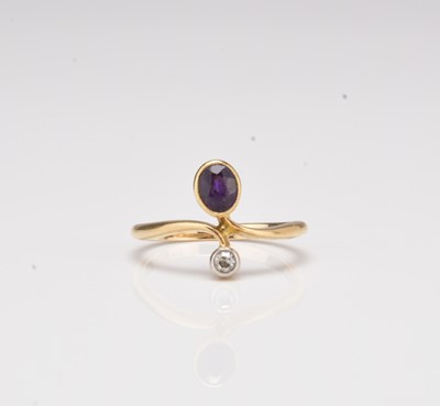 Lot An early 20th century amethyst and diamond ring