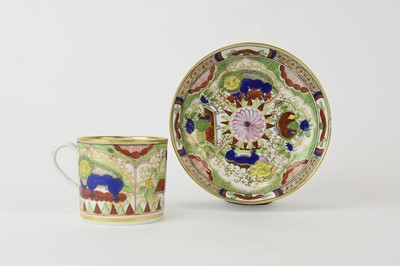 Lot 147 - A John Rose Coalport 'Dragon in Compartments' coffee can and saucer, circa 1800