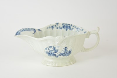 Lot 8 - A rare Worcester sauceboat in the 'Fisherman on a Towering Rock' pattern, circa 1755