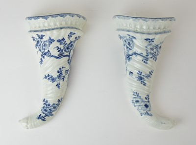 Lot 13 - A pair of Worcester 'Cornucopia Floral' wall pockets, circa 1755-58