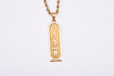Lot 295 - An Egyptian yellow metal hieroglyph pendant and chain