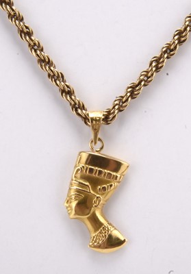Lot 318 - An Egyptian yellow metal Nefertiti pendant