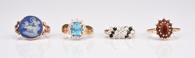 Lot 325 - Four 9ct gold rings