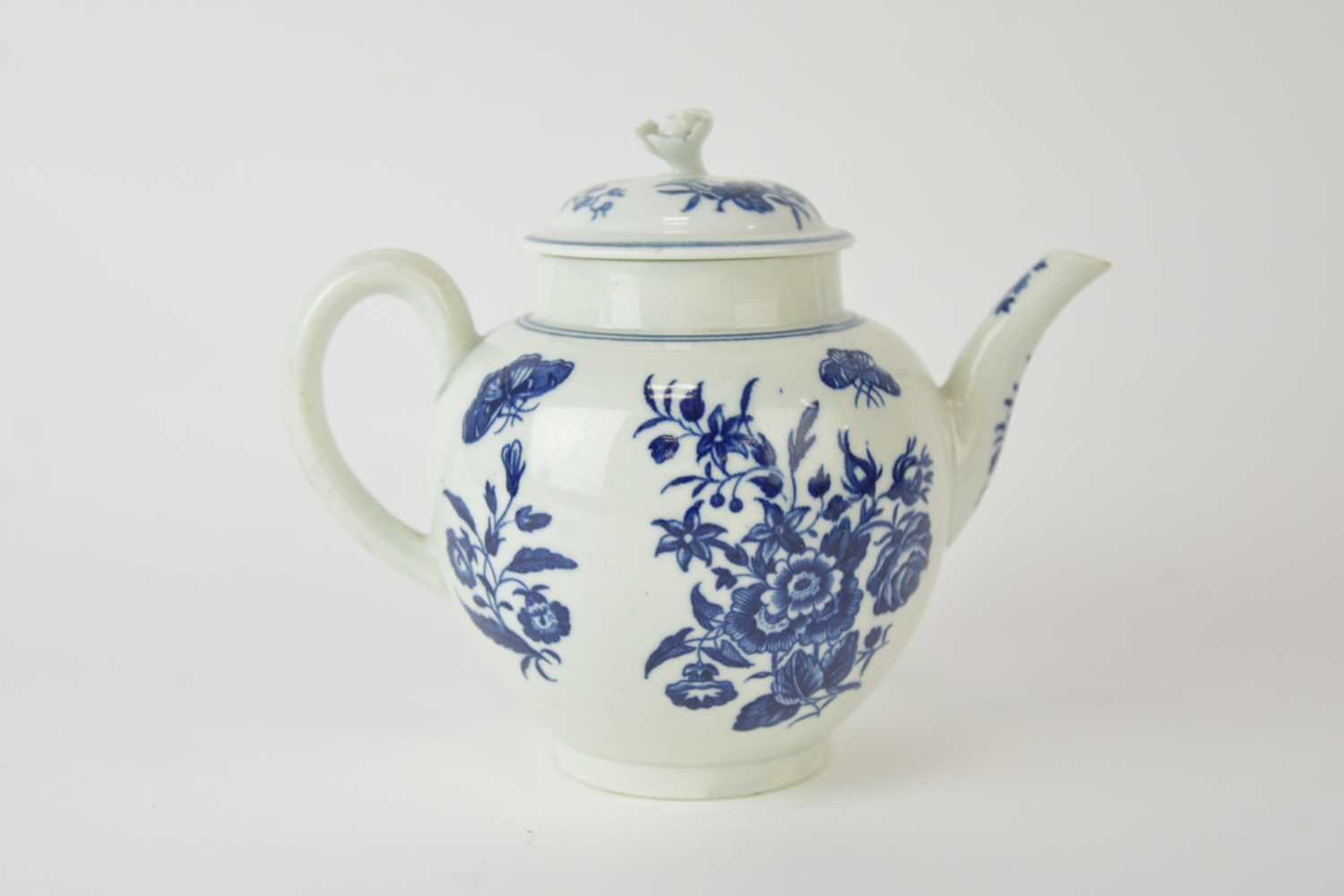 Lot 15 - A Worcester 'Three Flowers' teapot and cover, circa 1775-85