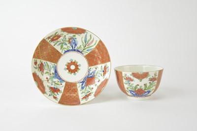 Lot A Caughley 'Scarlet and Gold Japan' tea bowl and saucer, circa 1785-90