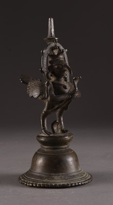 Lot 2 - A Nepalese bronze figural temple bell, 19th century