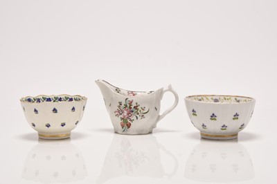 Lot 168 - John Rose cream jug and two Cornflower Sprigs tea bowls