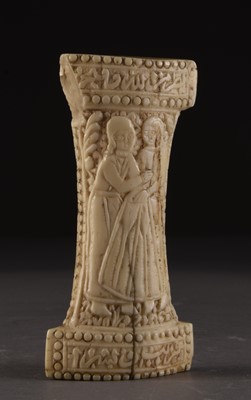 Lot 67 - A Persian carved marine ivory khanjar hilt, 19th century