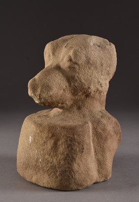 Lot 124 - A carved sandstone head of a monkey, possibly 9th century