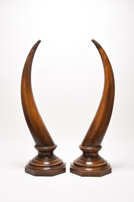 Lot 313 - A pair of decorative mahogany horns or tusks, late 20th century