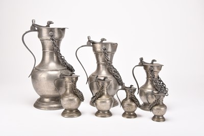 Lot A set of seven graduated Swiss pewter tappit hens
