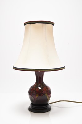 Lot 181 - Walter Moorcroft flambe 'Orchid' table lamp