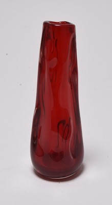 Lot 266 - William Wilson and Harry Dyer for Whitefriars, a ruby red knobbly vase, 24.5cm high