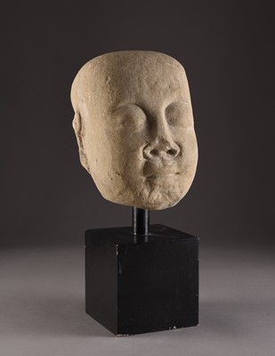 Lot 66 - A Chinese carved stone head of a luohan, Song Dynasty