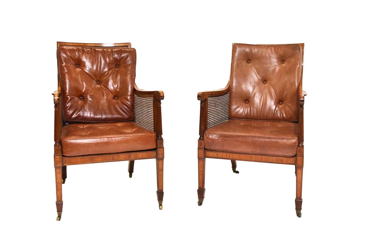 Lot 96 - A pair of 19th century caned bergère library chairs