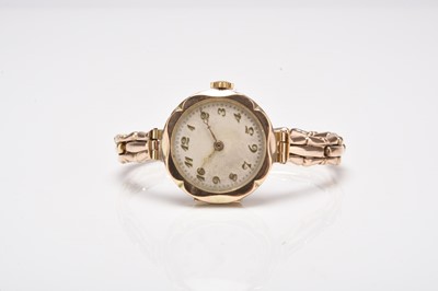 Lot 437 - A lady's 9ct gold bracelet watch