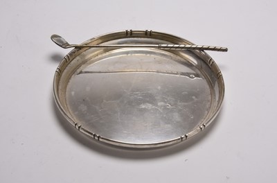 Lot 135 - A white metal shallow bowl of golfing interest