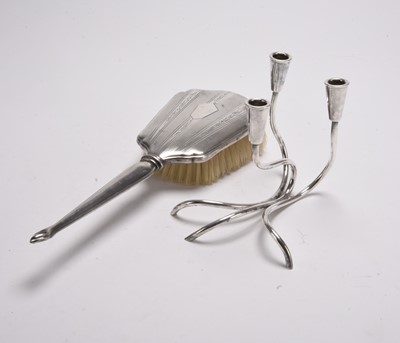 Lot 309 - A silver mounted brush and plated candle holder