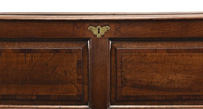 Lot 94 - An 18th century elm mule chest
