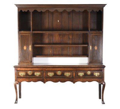 Lot 77 - A mid-18th century inlaid oak dresser and later rack