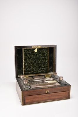 Lot 94 - A Victorian rosewood and brass-inlaid dressing case