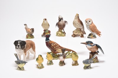 Lot 183 - A group of Beswick and Royal Worcester birds with a Beswick dogs