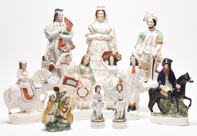 Lot 119 - Staffordshire figures including Dick Turpin, Queen Victoria and St. George