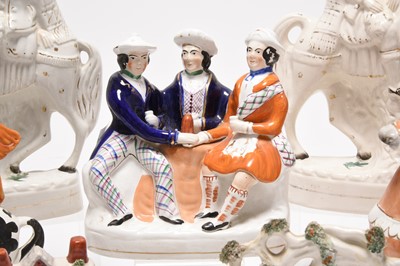 Lot 119 - Staffordshire figures including Dick Turpin, Queen Victoria and St. George