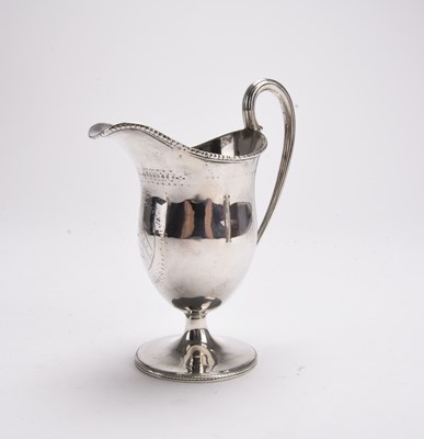 Lot 138 - A George III silver cream jug
