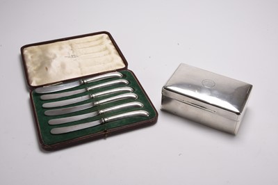Lot 65 - A silver cigarette box and a cased set of knives