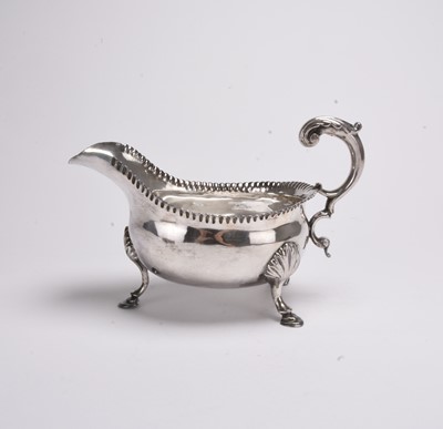 Lot 114 - A George III silver sauce boat