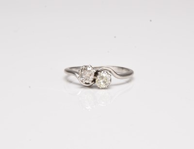 Lot A two stone old cushion cut diamond crossover ring