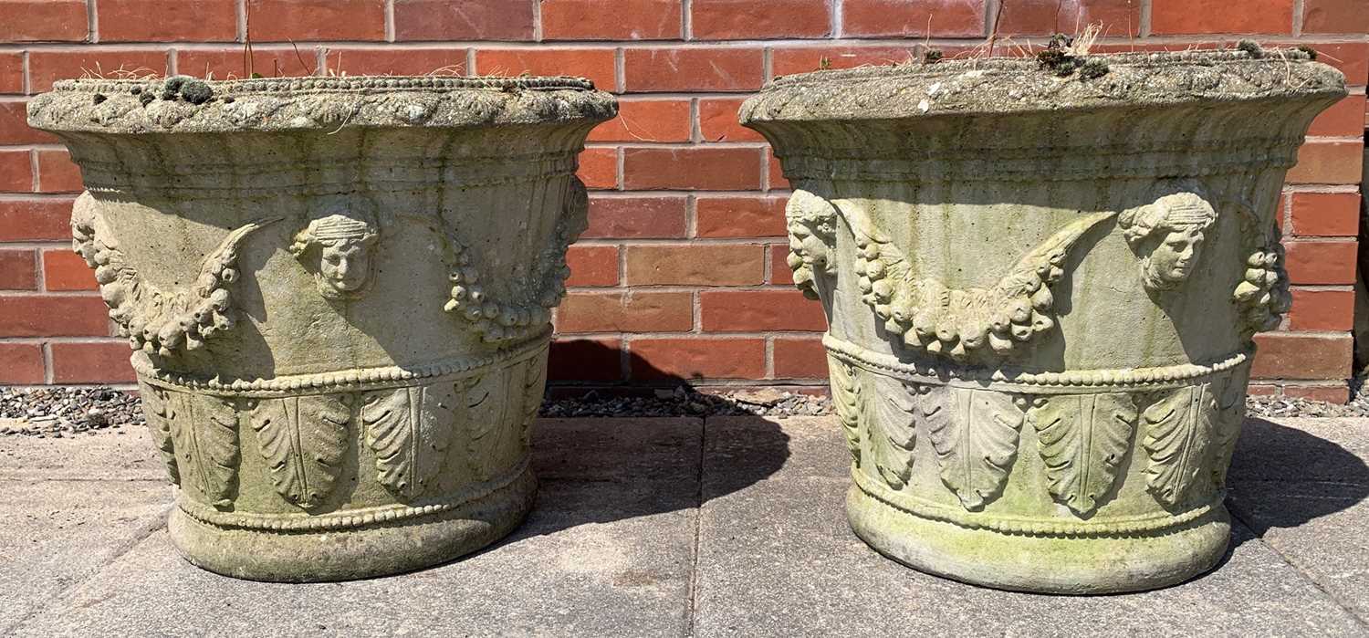 Lot 113 - A pair of composition garden urns, circa 1900
