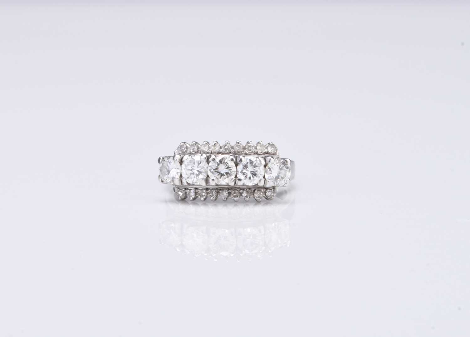 Lot 315 - A five stone diamond ring
