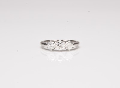 Lot 336 - An 18ct white gold three stone diamond ring