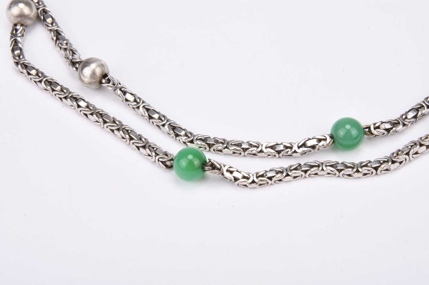Lot 204 - A white metal byzantine chain necklace