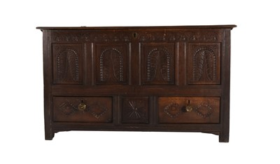 Lot 81 - An 18th century oak mule chest