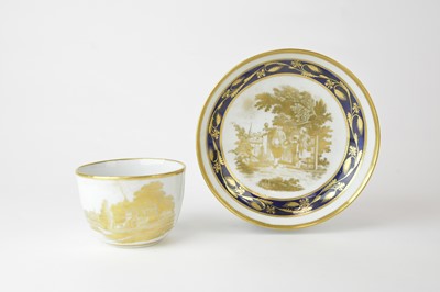 Lot 107 - A New Hall gilt and cobalt teacup and saucer, circa 1810
