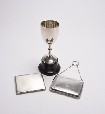 Lot 60 - A silver purse, cigarette case and goblet