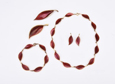 Lot 354 - A suite of Danish silver gilt and red enamel leaf jewellery