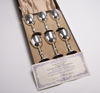 Lot 21 - A cased set of six commemorative silver goblets