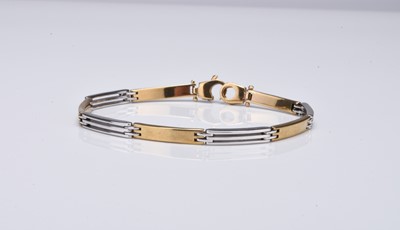Lot 248 - A 9ct yellow and white gold bracelet