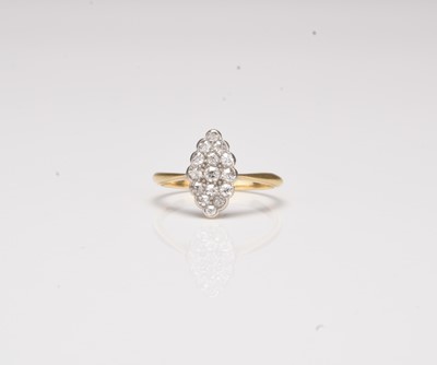 Lot 361 - A marquise shaped diamond cluster ring