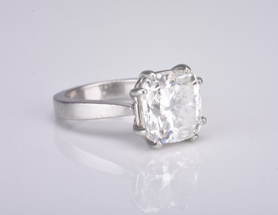 Lot 140 - A platinum single stone cushion cut diamond ring