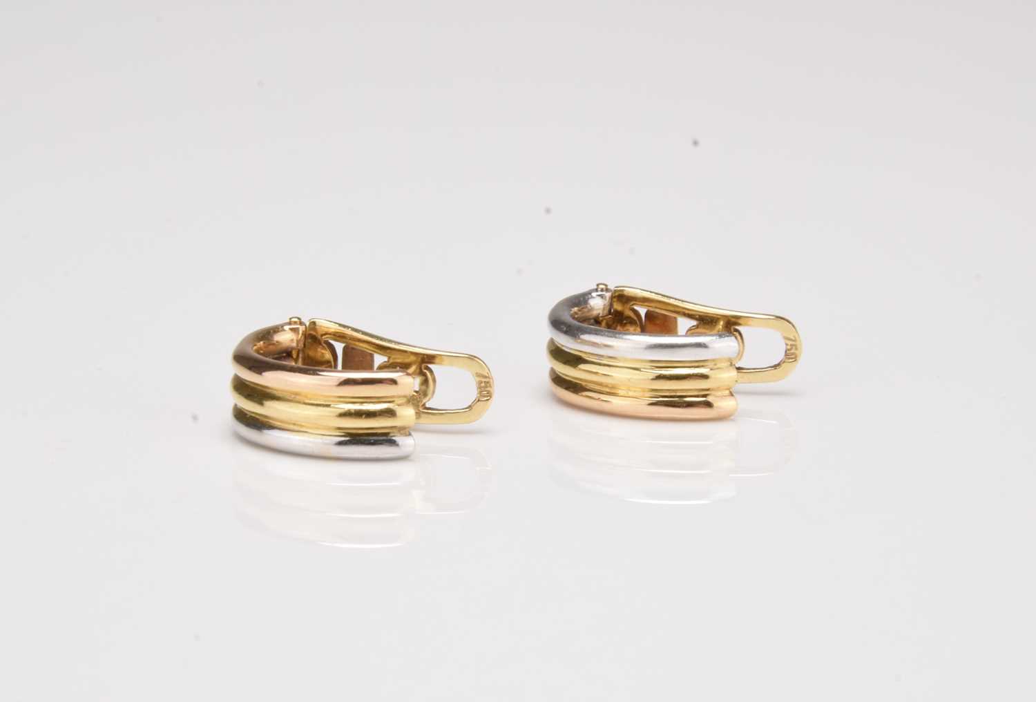 Lot 199 - A pair of 18ct tri-coloured gold hoop earrings