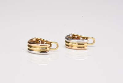 Lot 199 - A pair of 18ct tri-coloured gold hoop earrings